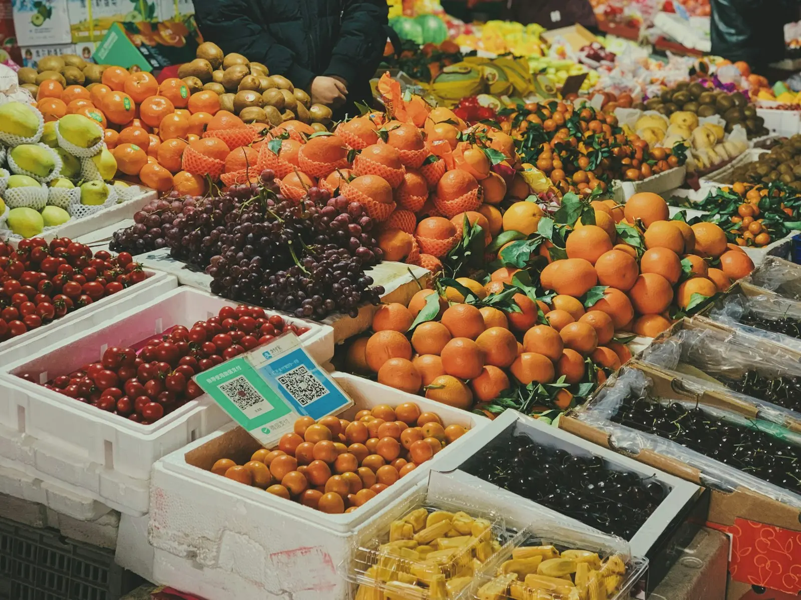 Crates of oranges and fresh produce